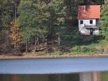 Ferienhäuser am Lipno Stausee Ferienhaus mit Ufergrundstück 4 Personen Ruderboot