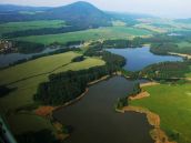 Ferienhäuser mit Ruderboot direkt am Ufer des Moldausee